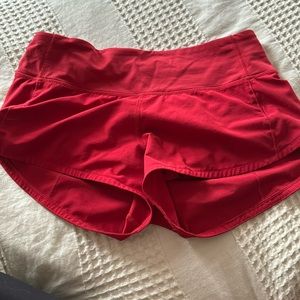 Lululemon red shorts 4 inch size 2